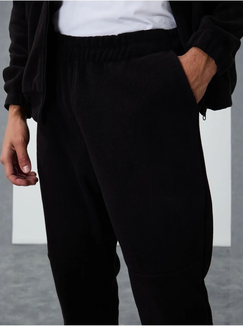 Ensemble homme sweatshirt à col zippé et pantalon tommy Noir - Kiabi