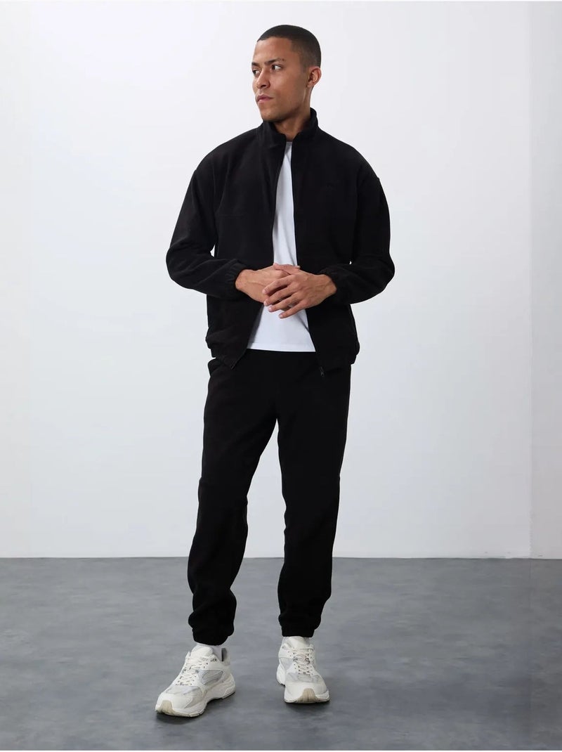 Ensemble homme sweatshirt à col zippé et pantalon tommy Noir - Kiabi