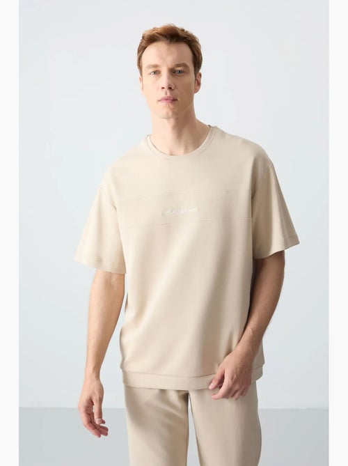 Ensemble homme t-shirt et pantalon oversize tommy - Kiabi Ensemble homme t-shirt et pantalon oversize tommy - Kiabi