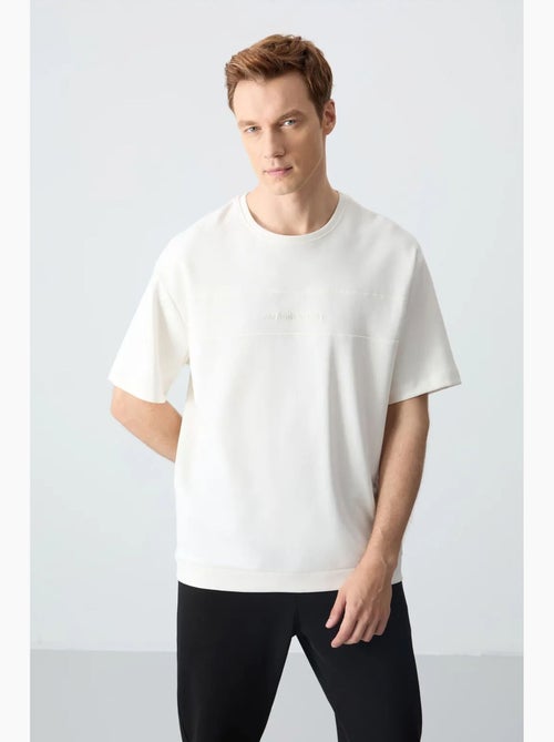 Ensemble homme t-shirt et pantalon oversize tommy - Kiabi Ensemble homme t-shirt et pantalon oversize tommy - Kiabi