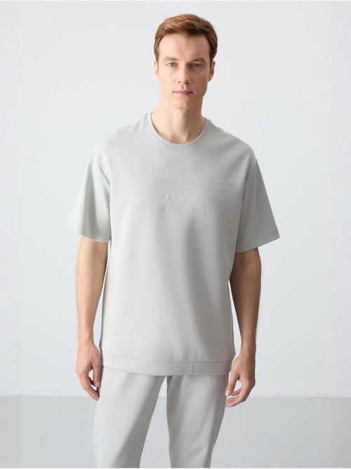 Ensemble homme t-shirt et pantalon oversize tommy - Kiabi Ensemble homme t-shirt et pantalon oversize tommy - Kiabi