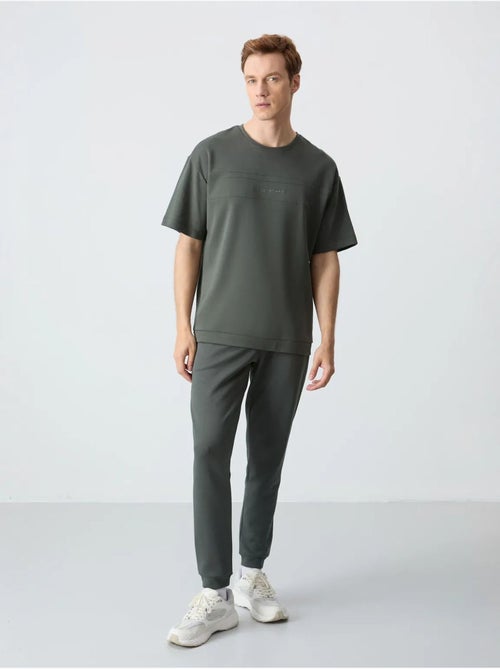 Ensemble homme t-shirt et pantalon oversize tommy - Kiabi Ensemble homme t-shirt et pantalon oversize tommy - Kiabi