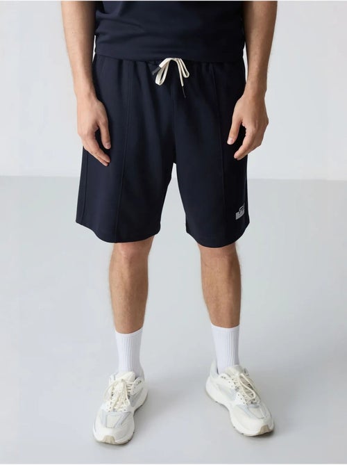 Ensemble homme t-shirt et short oversize tommy - Kiabi Ensemble homme t-shirt et short oversize tommy - Kiabi