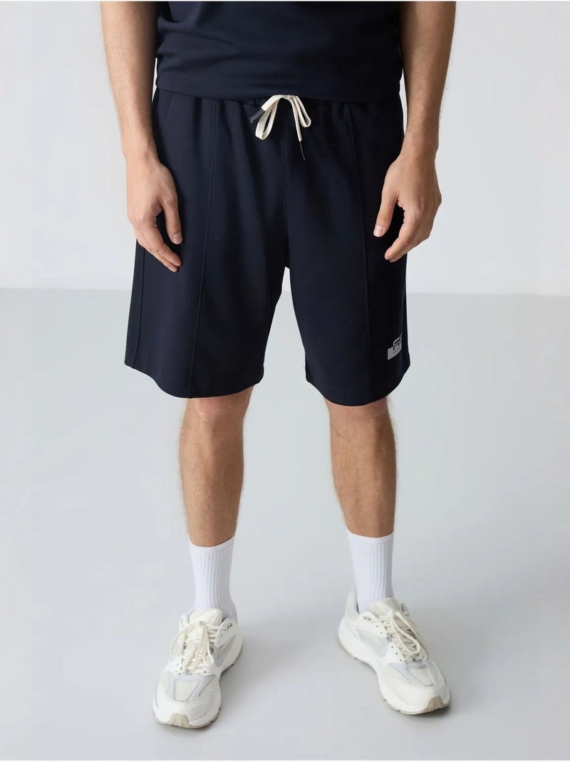 Ensemble homme t-shirt et short oversize tommy Bleu marine - Kiabi