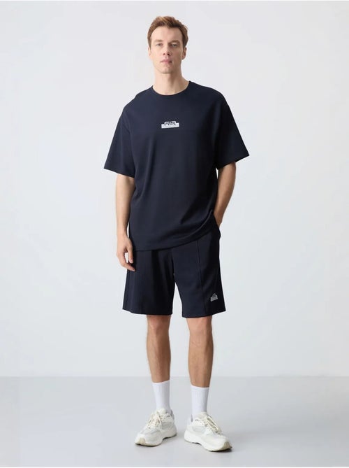 Ensemble homme t-shirt et short oversize tommy - Kiabi Ensemble homme t-shirt et short oversize tommy - Kiabi