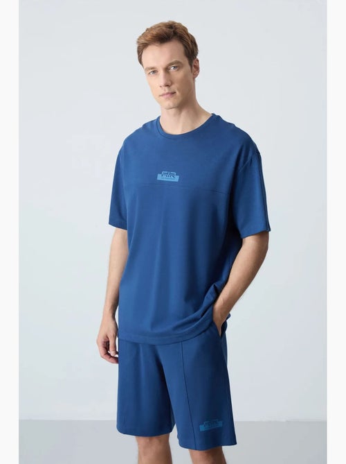 Ensemble homme t-shirt et short oversize tommy - Kiabi Ensemble homme t-shirt et short oversize tommy - Kiabi