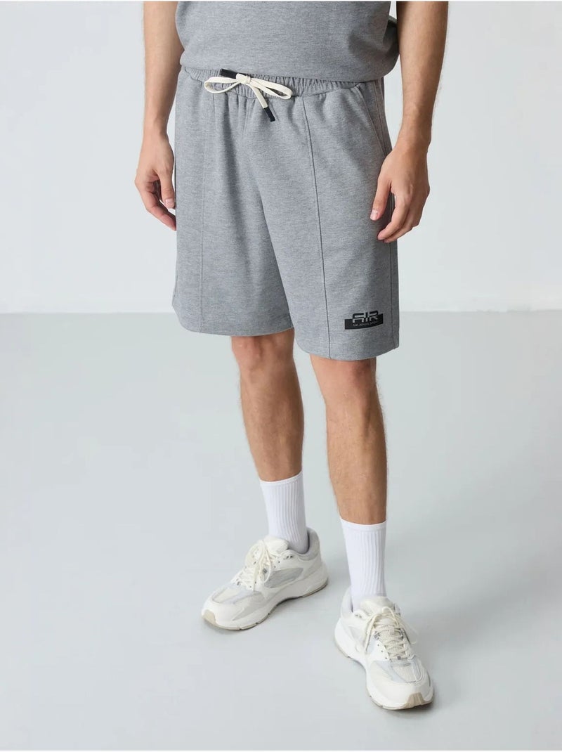 Ensemble homme t-shirt et short oversize tommy Gris - Kiabi