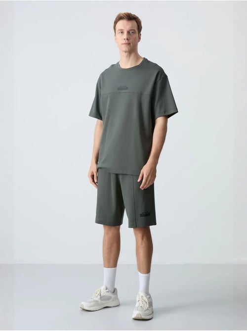 Ensemble homme t-shirt et short oversize tommy - Kiabi Ensemble homme t-shirt et short oversize tommy - Kiabi