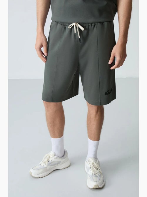 Ensemble homme t-shirt et short oversize tommy - Kiabi Ensemble homme t-shirt et short oversize tommy - Kiabi
