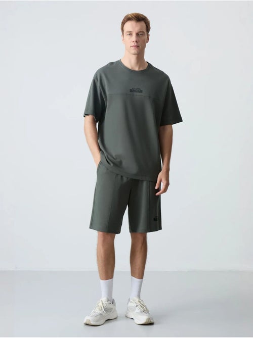 Ensemble homme t-shirt et short oversize tommy - Kiabi Ensemble homme t-shirt et short oversize tommy - Kiabi