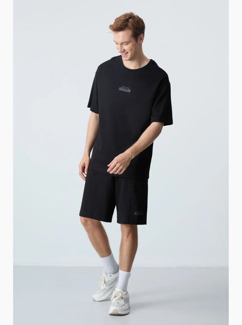 Ensemble homme t-shirt et short oversize tommy - Kiabi Ensemble homme t-shirt et short oversize tommy - Kiabi