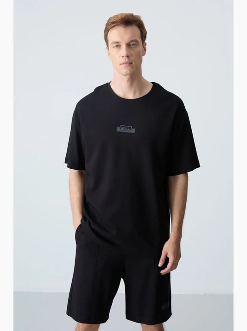 Ensemble homme t-shirt et short oversize tommy - Kiabi Ensemble homme t-shirt et short oversize tommy - Kiabi