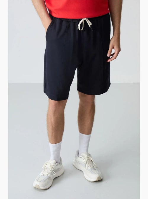 Ensemble homme t-shirt et short oversize tommy - Kiabi Ensemble homme t-shirt et short oversize tommy - Kiabi