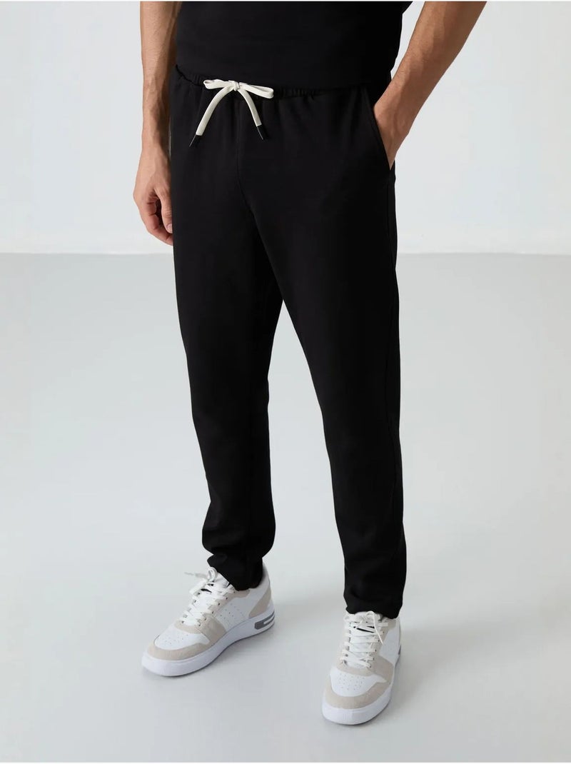 Ensemble homme t-shirt oversize et pantalon tommy Noir - Kiabi