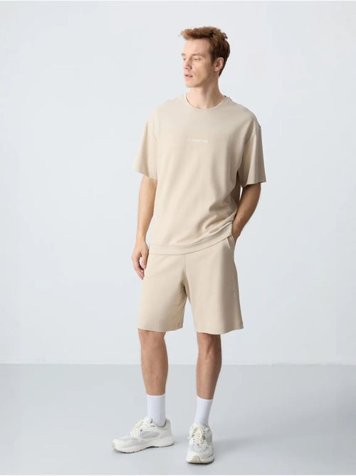 Ensemble homme t-shirt oversize et short en coton mélangé tommy - Kiabi Ensemble homme t-shirt oversize et short en coton mélangé tommy - Kiabi