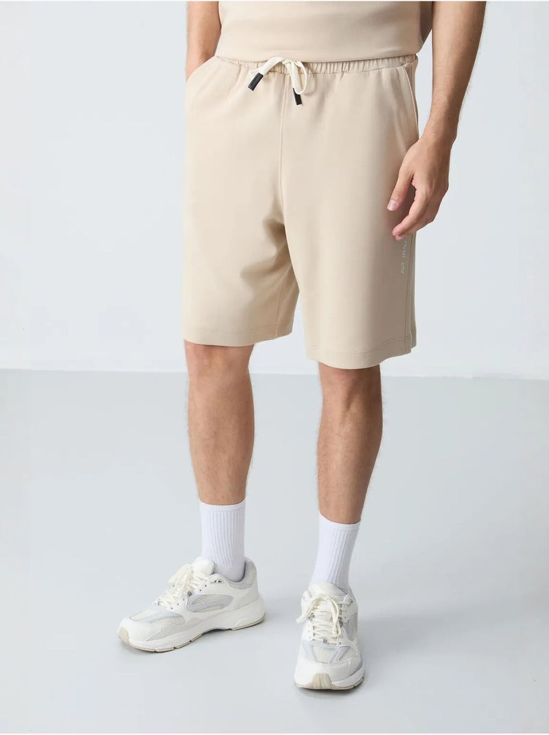 Ensemble homme t-shirt oversize et short en coton mélangé tommy Beige argile - Kiabi