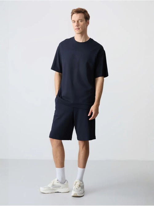 Ensemble homme t-shirt oversize et short en coton mélangé tommy - Kiabi Ensemble homme t-shirt oversize et short en coton mélangé tommy - Kiabi