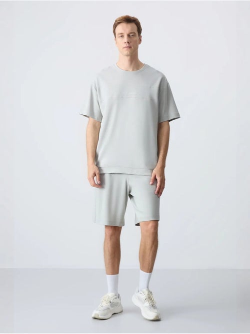 Ensemble homme t-shirt oversize et short en coton mélangé tommy - Kiabi Ensemble homme t-shirt oversize et short en coton mélangé tommy - Kiabi