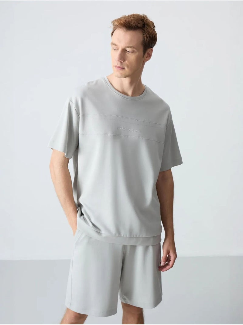 Ensemble homme t-shirt oversize et short en coton mélangé tommy Gris clair - Kiabi