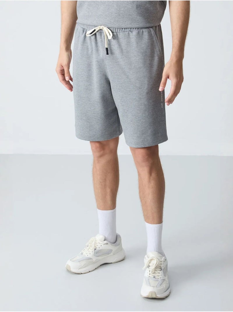 Ensemble homme t-shirt oversize et short en coton mélangé tommy Gris - Kiabi