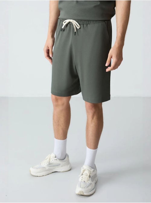 Ensemble homme t-shirt oversize et short en coton mélangé tommy - Kiabi Ensemble homme t-shirt oversize et short en coton mélangé tommy - Kiabi