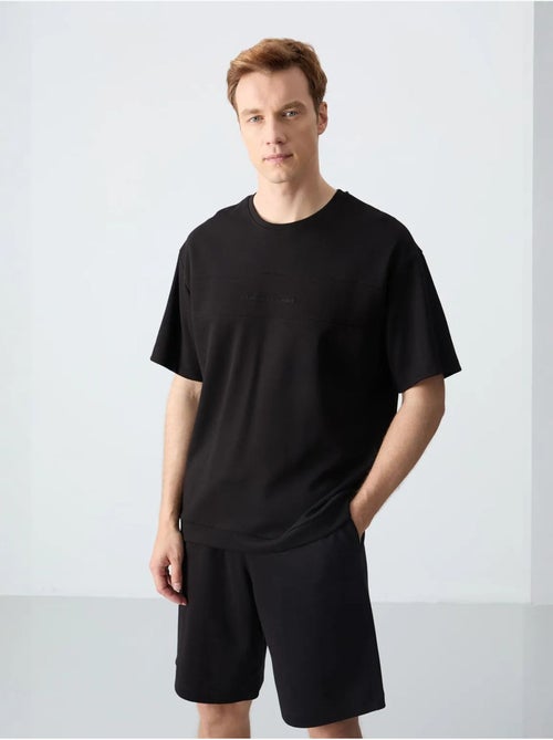 Ensemble homme t-shirt oversize et short en coton mélangé tommy - Kiabi Ensemble homme t-shirt oversize et short en coton mélangé tommy - Kiabi