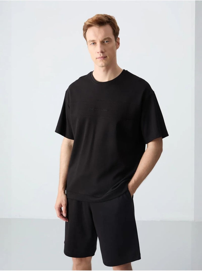 Ensemble homme t-shirt oversize et short en coton mélangé tommy Noir - Kiabi