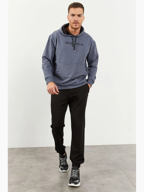 Ensemble oversize sweat à capuche et pantalon tommy - Kiabi Ensemble oversize sweat à capuche et pantalon tommy - Kiabi