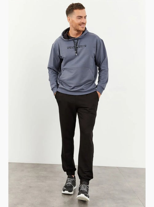 Ensemble oversize sweat à capuche et pantalon tommy - Kiabi Ensemble oversize sweat à capuche et pantalon tommy - Kiabi