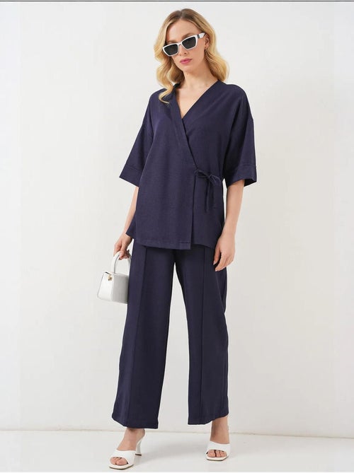 Ensemble pantalon kimono surdimensionné à col en v et fermeture à nouer bdart - Kiabi Ensemble pantalon kimono surdimensionné à col en v et fermeture à nouer bdart - Kiabi