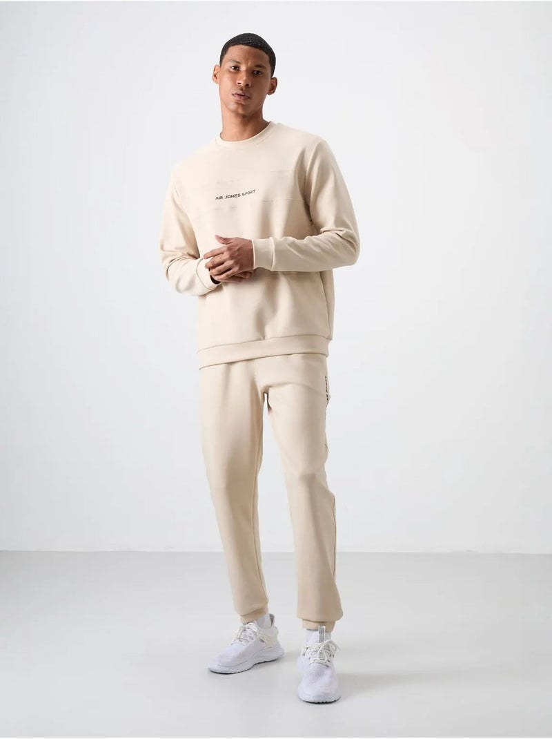 Ensemble sweat et pantalon en molleton imprimé tommy Beige argile - Kiabi