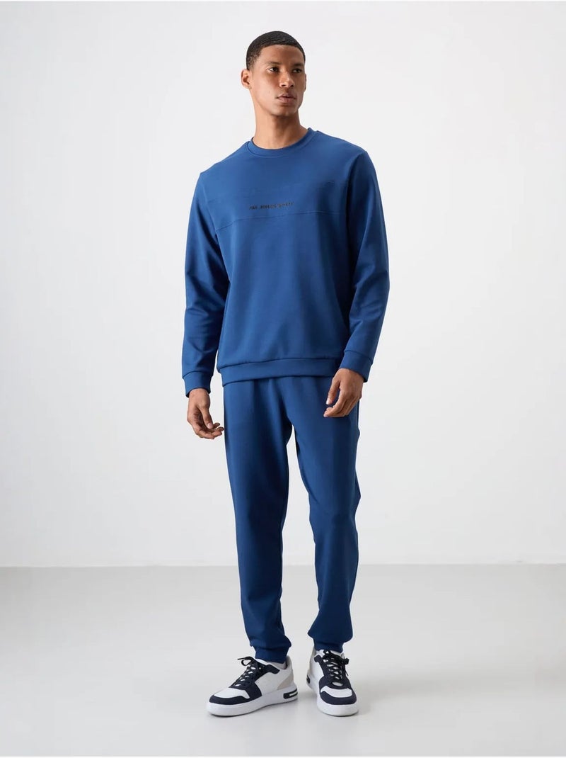 Ensemble sweat et pantalon en molleton imprimé tommy Bleu - Kiabi
