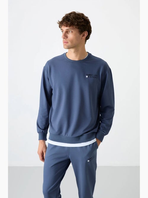 Ensemble sweat et pantalon oversize col rond tommy - Kiabi Ensemble sweat et pantalon oversize col rond tommy - Kiabi