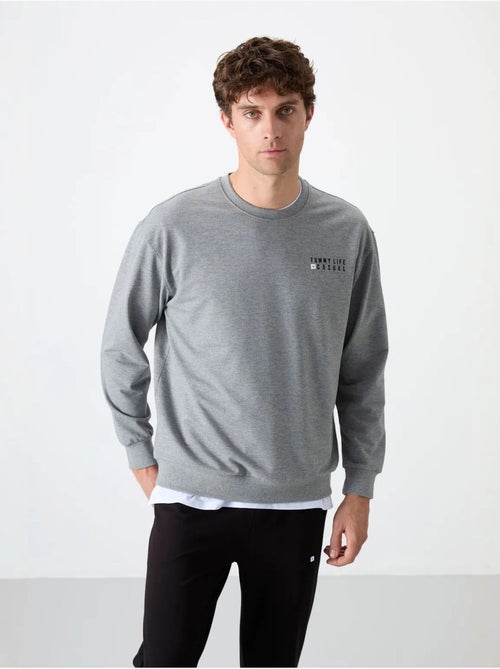 Ensemble sweat et pantalon oversize col rond tommy - Kiabi Ensemble sweat et pantalon oversize col rond tommy - Kiabi