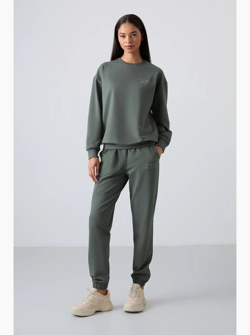 Ensemble sweat-shirt et pantalon oversize à col rond tommy Vert - Kiabi