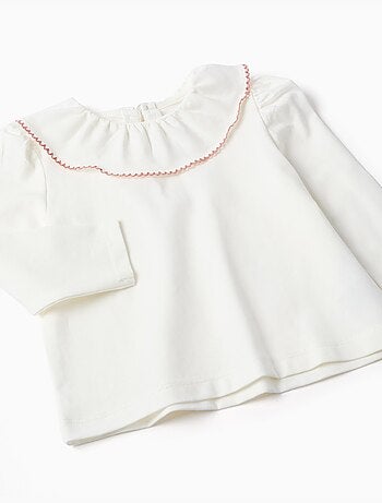 Ensemble t-shirt et robe salopette en velours côtelé