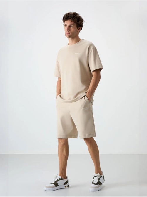 Ensemble t-shirt et short oversize tommy - Kiabi Ensemble t-shirt et short oversize tommy - Kiabi