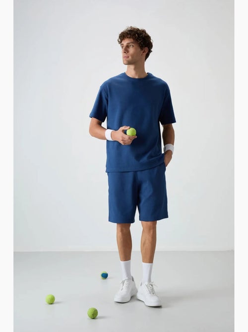 Ensemble t-shirt et short oversize tommy - Kiabi Ensemble t-shirt et short oversize tommy - Kiabi