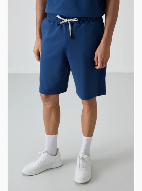 Ensemble t-shirt et short oversize tommy - Kiabi Ensemble t-shirt et short oversize tommy - Kiabi