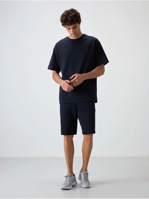 Ensemble t-shirt et short oversize tommy - Kiabi Ensemble t-shirt et short oversize tommy - Kiabi