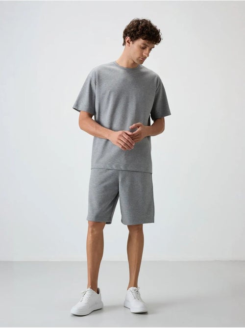 Ensemble t-shirt et short oversize tommy - Kiabi Ensemble t-shirt et short oversize tommy - Kiabi