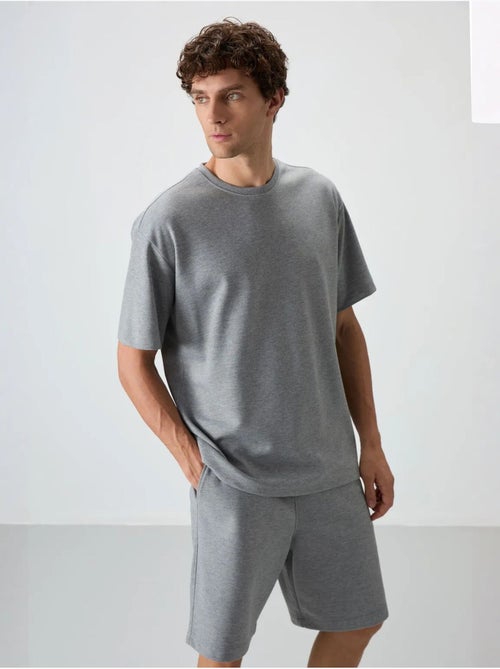 Ensemble t-shirt et short oversize tommy - Kiabi Ensemble t-shirt et short oversize tommy - Kiabi
