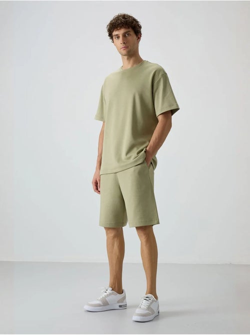 Ensemble t-shirt et short oversize tommy - Kiabi Ensemble t-shirt et short oversize tommy - Kiabi