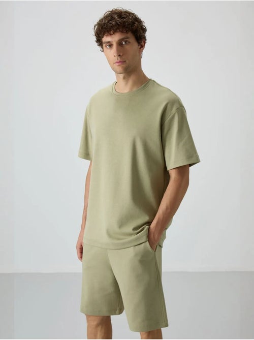Ensemble t-shirt et short oversize tommy - Kiabi Ensemble t-shirt et short oversize tommy - Kiabi
