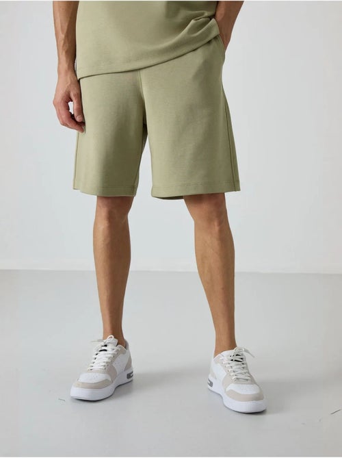 Ensemble t-shirt et short oversize tommy - Kiabi Ensemble t-shirt et short oversize tommy - Kiabi