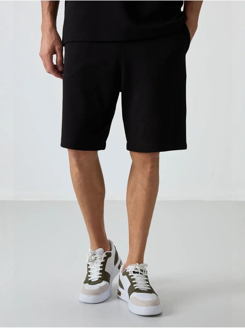 Ensemble t-shirt et short oversize tommy Noir - Kiabi
