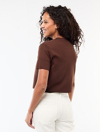 Fermeture par bijou doré au col