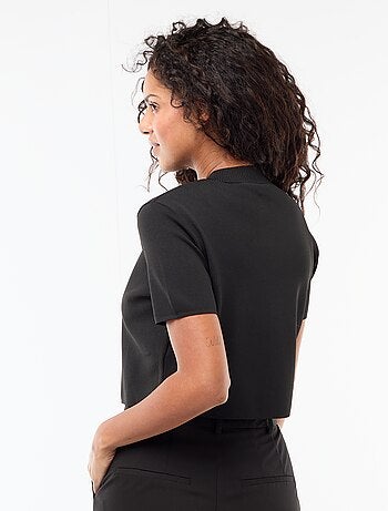 Fermeture par bijou doré au col