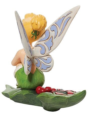 Figurine de collection Fée Clochette assise sur du houx