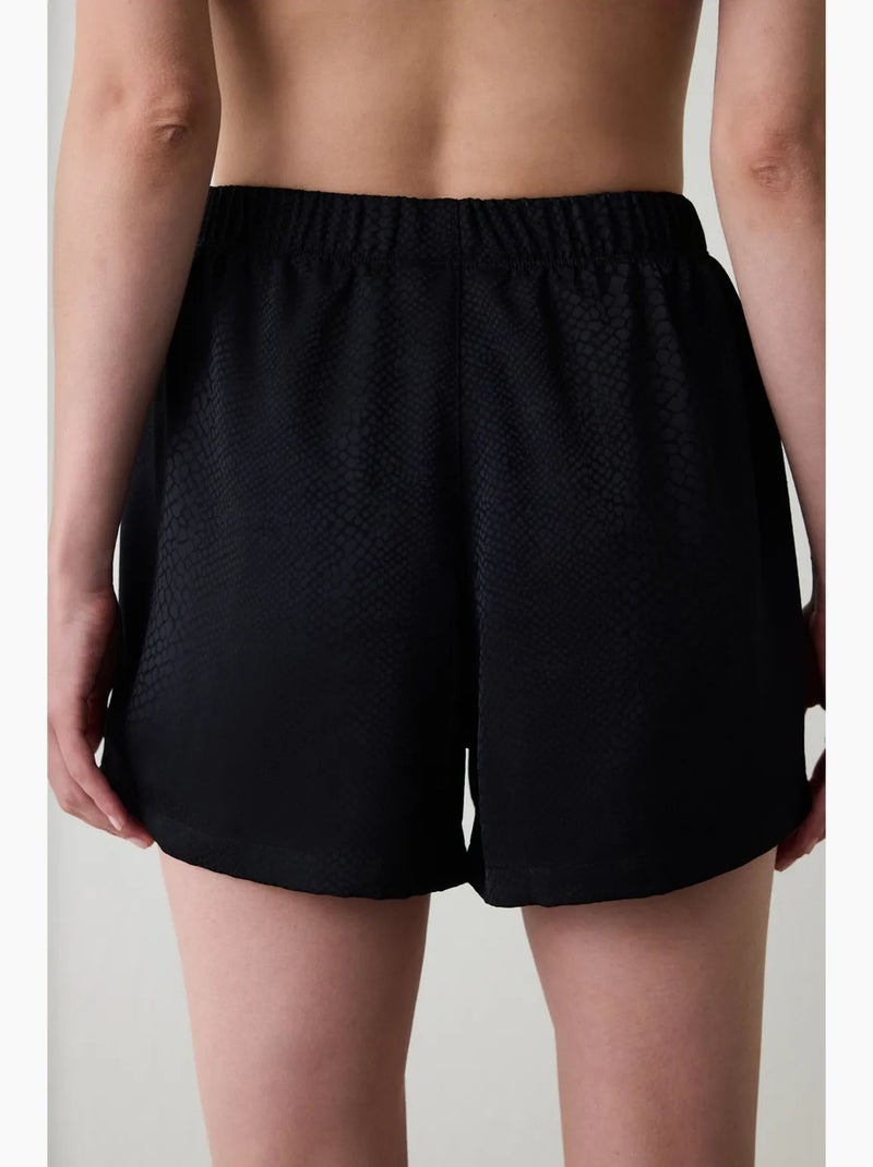 Fleur bas de pyjama en satin penti Noir - Kiabi